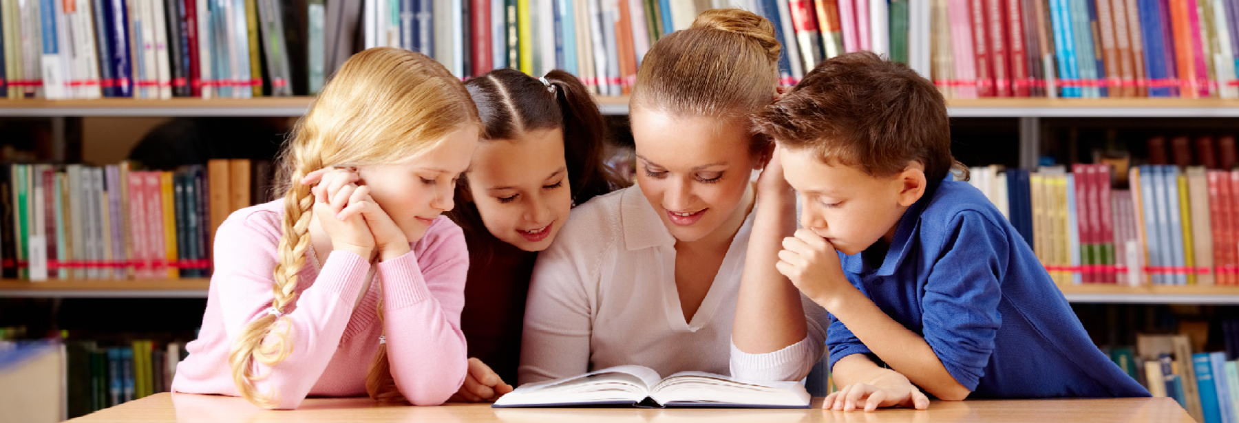 Library with children reading books